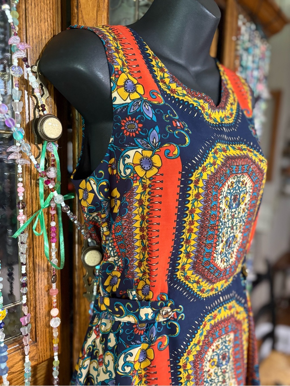 bohemian printed sleeveless dress defined cinch waist flowy mini-length skirt. - Picture 7 of 16